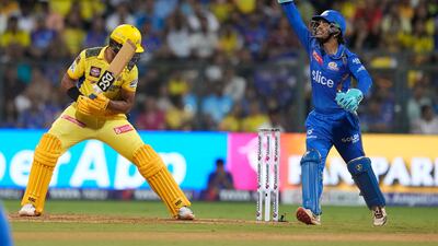 Mumbai Indians' Ishan Kishan, right, appeals successfully for the wicket of Chennai Super Kings' Rachin Ravindra, left, who made 21 runs off 16 balls. AP