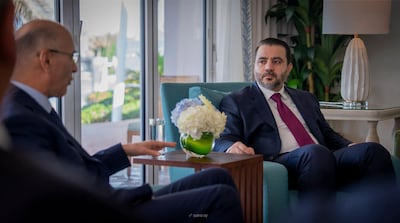 Lebanese Interior Minister Ahmad Al Hajjar, left, meets Syrian Foreign Minister Asaad Al Shibani during the Manama Dialogue 2025 forum. Photo: SANA