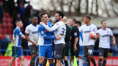 Michael Rose of Rochdale and Chris Eagles of Bury shake hands after their FA Cup second round match on Sunday, a 1-0 win for visitors Bury. Alex Livesey / Getty Images