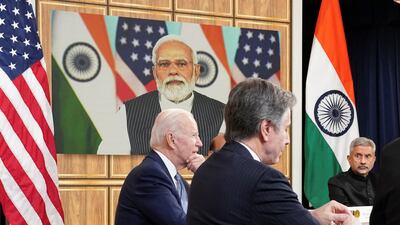 US President Joe Biden, seated with US Secretary of State Antony Blinken and Indian External Affairs Minister Subrahmanyam Jaishankar, holds a videoconference with Indian Prime Minister Narendra Modi from Washington April 2022. Reuters