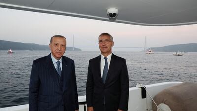 Turkish President Tayyip Erdogan and Nato Secretary General Jens Stoltenberg pose as they sail through Bosphorus in Istanbul. Reuters