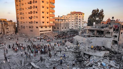 People search amid the rubble for survivors following an Israeli strike in Rafah in the southern Gaza Strip. AFP