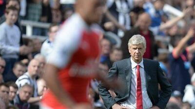 Arsenal manager Arsene Wenger observes his side during their Premier League match against Newcastle United on Saturday. Oli Scarff / AFP / August 29, 2015