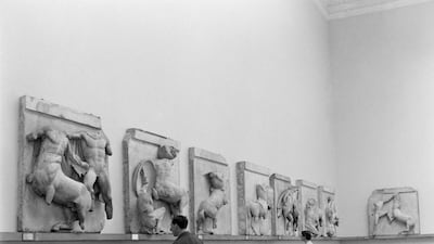 Visitors viewing the Parthenon Sculptures, also known as the Elgin Marbles, in the Egyptian Galleries in 1954