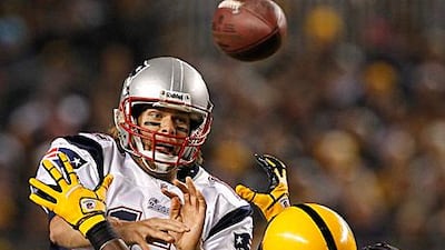 Tom Brady throws through Pittsburgh coverage.