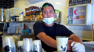 Mark Tan, of Ochado Bubble Tea Café, was at work when the deadly blast rocked the neighbourhood. Victor Besa / The National