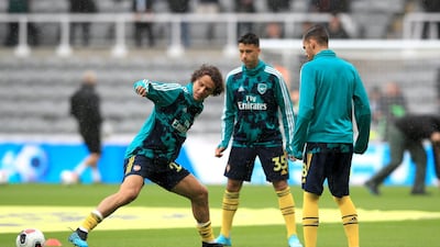 David Luiz: Left on the Arsenal bench after joining from Chelsea. PA Wire