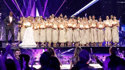 Terry Crews with Mayyas on stage. Getty Images