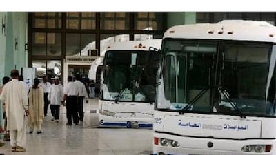 The Abu Dhabi bus terminal, with its new blue-and-white air-conditioned buses, is a gateway to many parts of the UAE. Andrew Parsons / The National
