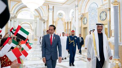 Sheikh Mohamed bin Zayed, Crown Prince and Deputy Supreme Commander of the UAE Armed Forces, welcomes Joko Widodo, President of Indonesia, to Qasr Al Watan in Abu Dhabi on Sunday. Courtesy Sheikh Mohamed bin Zayed Twitter