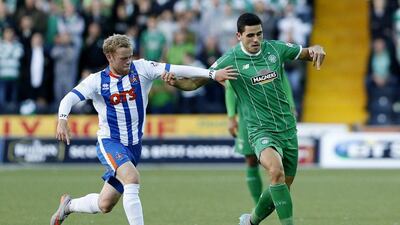 Nir Bitton of Celtic dribbles by Kilmarnock's Steven Smith in their Scottish Premiership contest on Wednesday. Russel Cheyne / Action Images / Reuters / August 12, 2015