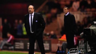 Chelsea manager Rafa Benitez, left, went on a critical rant about his club and the fans after last Wednesday's FA Cup win and now those same fans will welcome back their doomed manager on Saturday at Samford Bridge. Stu Forster/ Getty Images