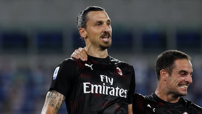 AC Milan's Zlatan Ibrahimovic, left, celebrates with his teammate Giacomo Bonaventura. AP