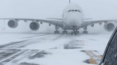 A Singapore Airlines Airbus A380, diverted from John F Kennedy Airport during a winter storm, is shown on the runway after landing at Stewart International Airport in Newburgh. Reuters