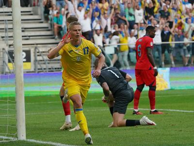 Oleksandr Zinchenko celebrates scoring the opening goal against England in Wroclaw. AFP