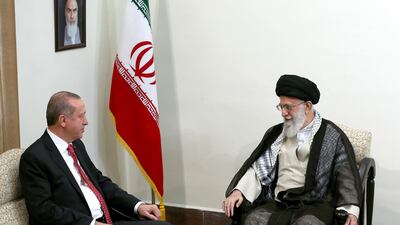 Iran's supreme leader Ayatollah Ali Khamenei, right, meets Turkish President Recep Tayyip Erdogan in Tehran. Office of the Iranian Supreme Leader via AP