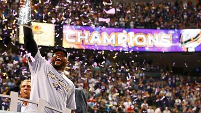 Baltimore linebacker Ray Lewis celebrates with the Vince Lombardi trophy after the Ravens' victory in the Super Bowl.