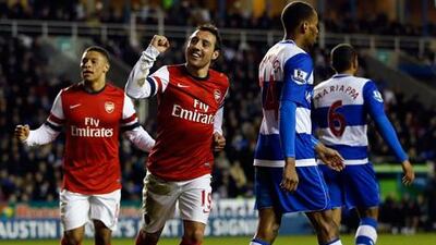 Arsenal's Santi Cazorla celebrates scoring against Reading.