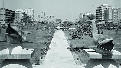 Dolphins in Hamdan St These dolphins formed part of a park that once extended from the end of Airport Road to Hamdan Street, but was closed to make way for the construction of the underpass. Instead a series of dramatic new monuments were conceived, which can be seen today: a cannon, coffee pot, incense burner and fort tower that are among the gigantic symbols of the UAE in Ittihad Square.
