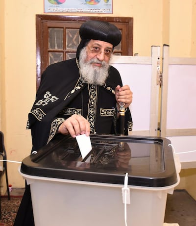 Egypt's Coptic Orthodox Pope Tawadros II casting his ballot paper in Cairo. EPA