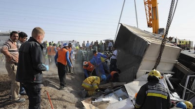 The lorry overturned and landed on the bus at 7.53am when its brakes failed, according to Brig Gen Hussein Ahmed Al Harthi, head of the Traffic and Patrols Directorate at Abu Dhabi Police. Courtesy Al Ain Police