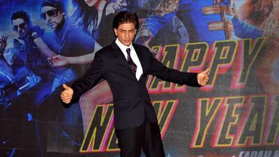 1) Happy new Year star Shah Rukh Khan charges Rs35 crore per film and is No 1 in the Forbes earnings list. AFP Photo