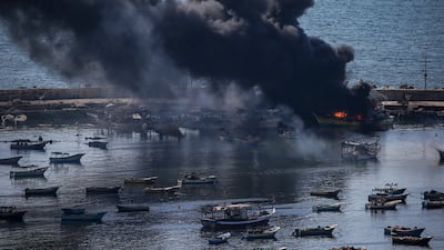 Smoke rises from the Gaza port following an Israeli air strike, in Gaza city. EPA