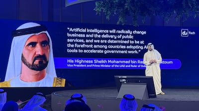 Jasim Al Awadi, chief information and communications technology officer of du, addresses the company's Envision conference in Dubai on Tuesday. The National