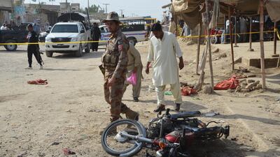 Pakistani security officials inspecting the scene of a blast in Balochistan last month. Zahid Hussain / EPA