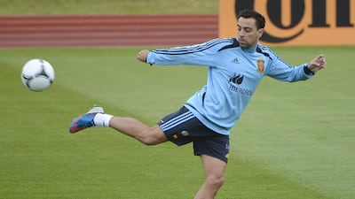 Xavi, midfielder (Barcelona); Age 34; 130 caps. Midfield orchestrator who has set new standards for a central playmaker, leading Spain to victory in last three major tournaments. Passing, vision and composure remain unrivalled as he winds down his playing career and eyes a coaching role. Pierre-Philippe Marcou / AFP