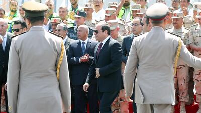 Egyptian President Abdel Fattah El Sisi walks past an honour guard in Cairo on May 15.EPA
