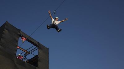 There was fun to be had for the grown-ups too at the National Day celebrations at Yas Marina Circuit, with a zip line ride there for the conquering. Delores Johnson / The National