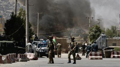 Smoke billows after armed militants attacked the area close to the Presidential place and other government offices, during Eid al-Adha celebrations in Kabul, Afghanistan. EPA