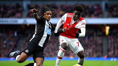 Bukayo Saka, left, of Arsenal and Newcastle's Valentino Lazaro. Getty