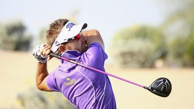 Jbe Kruger of South Africa plays his tee shot on the 18th hole during the final round of the Dubai Open at The Els Club Dubai on December 21, 2014 in Dubai, United Arab Emirates. (Photo by Francois Nel/Getty Images)