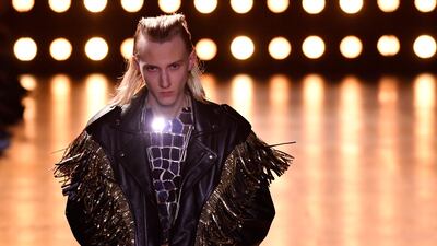 Another shimmery jacket on the catwalk. AFP