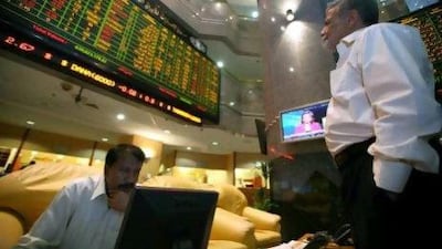 The share prices of both Aldar Properties and Sorouh Real Estate rose exactly the same amount yesterday to close up 7.9 per cent at Dh1.24. Above, Abu Dhabi Securities Exchange. Nicole Hill / The National