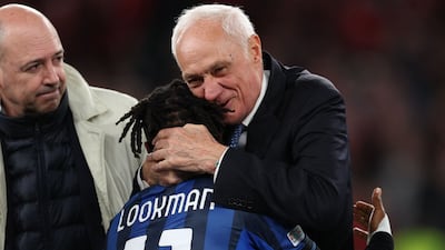 Atalanta President Antonio Percassi hugs Ademola Lookman after his team won the Europa League final. AFP