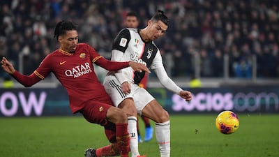 Chris Smalling and Cristiano Ronaldo. AFP