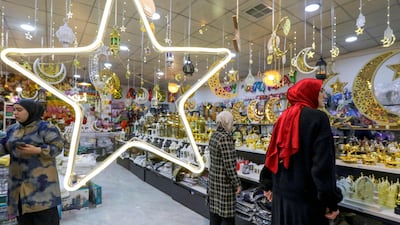 Women shopping for decorative items for Ramadan at a shop in Erbil, the capital of Iraq's northern autonomous Kurdish region. AFP