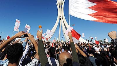 Protesters in Manama converge at Pearl Square in February. The landmark monument was demolished a month later.