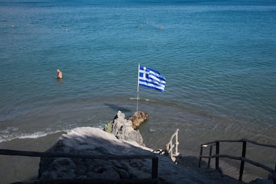 A Greek flag on the island of Crete. Greece says the agreement between Turkey and Libya breaches the territorial rights of its islands. Getty Images