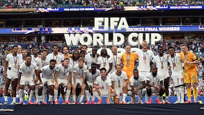 England's players with their medals, after winning the third-place play-off against France in Miami. AFP