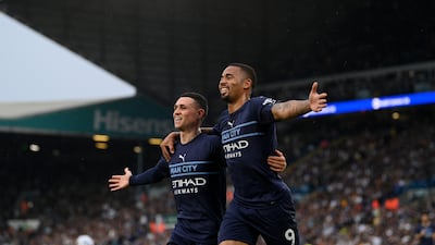Gabriel Jesus with Phil Foden after scoring City's third goal. Getty