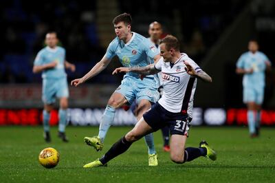 Bolton Wanderers, in white, recently beat Sunderland to boost their hopes of survival. Lee Smith / Reuters