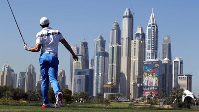 Rory McIlroy reacts after a tee shot during the third round of the Dubai Desert Classic on Saturday. Ali Haider / EPA / February 6, 2016