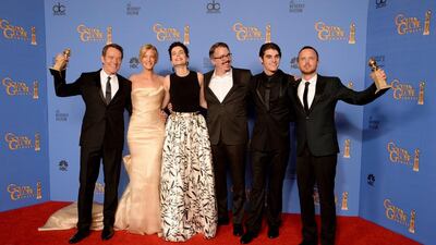 Actors Bryan Cranston, Anna Gunn and Betsy Brandt, writer-producer Vince Gilligan, actors R.J. Mitte and Aaron Paul celebrate winning Best Series - Drama for Breaking Bad. AFP