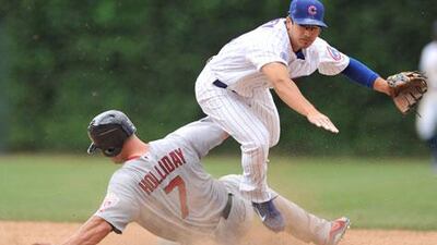 Matt Holliday slides for second base for St Louis against the Cups
