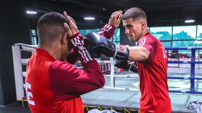 Muaythai UAE champion Mohammed Mardi, right, and Ahmed Al Shammar.