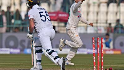 Pakistan's Abrar Ahmed, right, celebrates after taking the wicket of England's Ben Stokes. AP